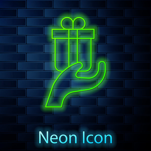 发光的霓虹灯线给礼物图标隔离在砖上图片下载