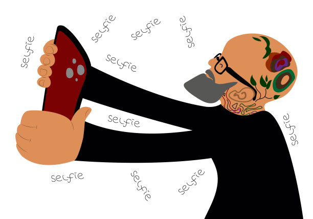 Hipster man with beard, glasses, Tattoo holding smart phone and taking picture of herself.图片下载