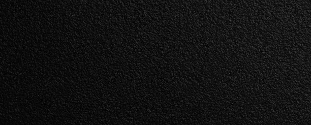 光滑的黑色塑料颗粒图案表面的背景图片下载