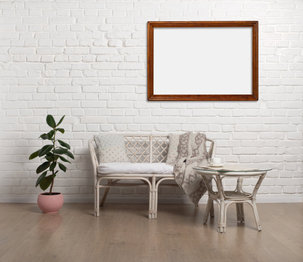 藤客厅爱的座椅在白色砖墙背景与相框模型图片下载