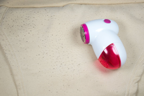 毛衣起球便携式机器。衣服布料剃须刀。头发球修剪器。电动除毛机羊毛球，绒毛，绒线。图片下载