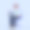 微笑的亚洲男子菲利克斯在办公椅上用笔记本电脑工作的3D插图。白色背景上的3D渲染。图片下载