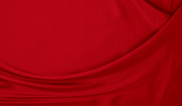 黑色红色缎面深色面料质地豪华闪亮，是抽象的丝绸布料背景与图案柔软的波浪模糊美丽。图片下载