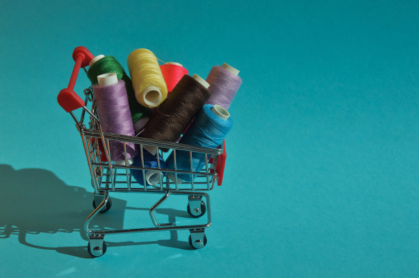 缝纫、针线活用棉线。设计背景。图片下载