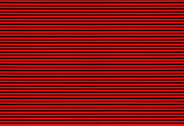 红色波纹金属片的纹理。红色金属快门背景设计。图片下载