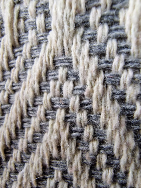 机织织物上的缝合的极端特写图片下载