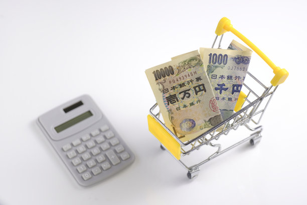 金钱计算器和购物车。翻译:10000日元图片下载