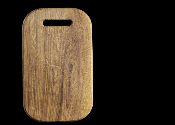 木制切菜板上的黑色背景空间文字图片下载