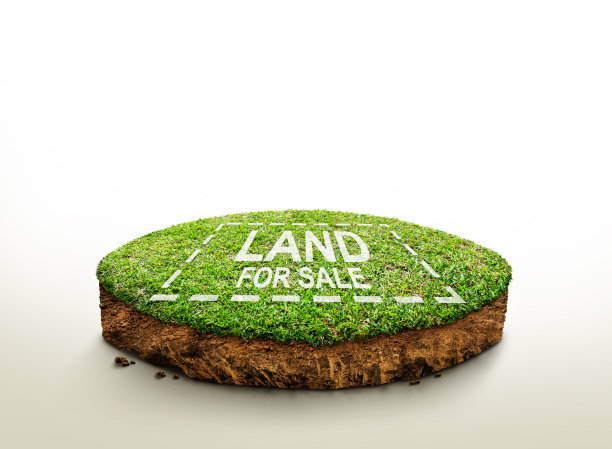 待售土地标志对着草地，在隔间土壤和地质断面上以绿草为主，地面生态隔离在浅色上。图片下载