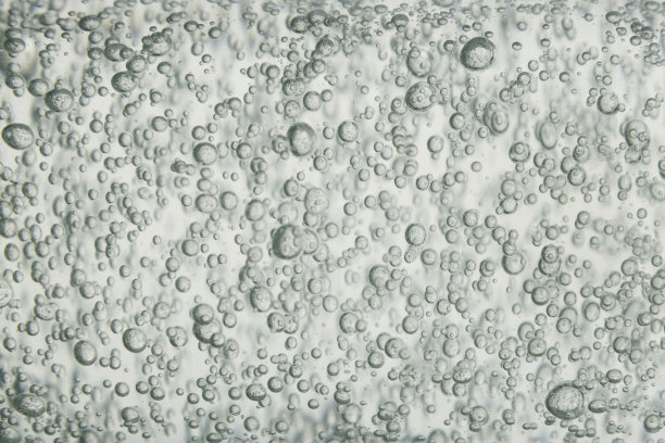 透明质酸凝胶。宏观照片。背景为氧气气泡图片下载