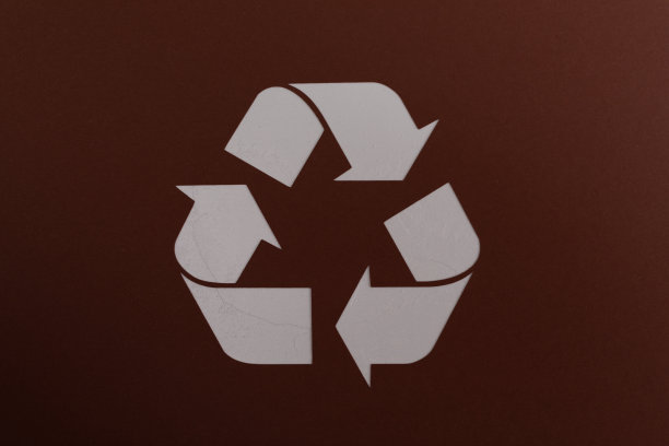 棕色背景上的回收符号图片下载