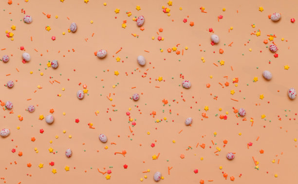 复活节背景装饰。糖果糖粉，复活节蛋糕装饰。图片下载