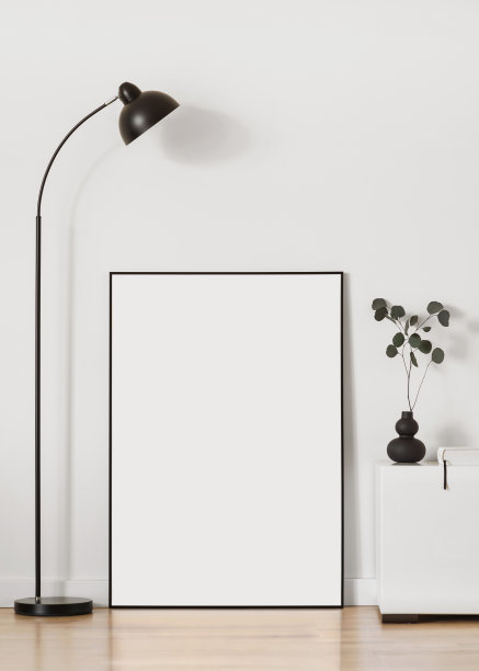 室内设计中的艺术品模型。墙上的空白画框。垂直方向图片下载