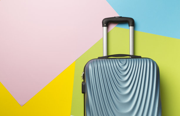 蓝色行李箱的颜色背景，俯视图图片下载