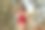 美丽的白人女性性感的女人在红色泳装比基尼寒冷和放松戴着太阳镜，在海滩的森林里拿着帽子图片下载