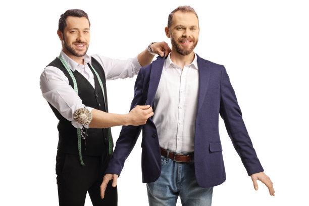 裁缝正在为一套男式西装量尺寸图片下载