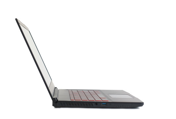 侧面视图打开笔记本电脑的白色背景图片下载