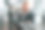 使用图形平板。三个人在汽车陈列室里一起工作图片下载