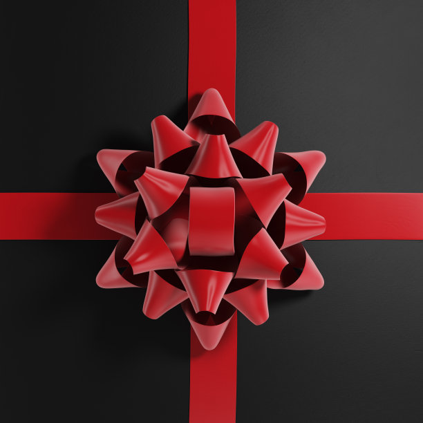 红色缎面蝴蝶结，圣诞礼物元素。黑色礼盒与蝴蝶结和丝带。图片下载