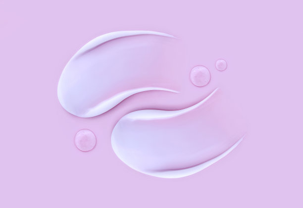 化妆品涂抹奶油纹理的粉红色背景图片下载