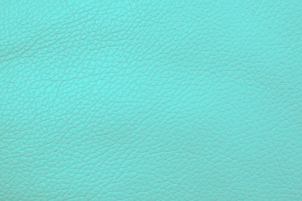 微距拍摄蓝色皮革纹理背景。部分穿孔皮革细节。蓝色穿孔皮革纹理背景。质地、人造革图片下载