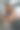 坐杠铃。美丽的女人与运动身体类型是在健身房图片下载