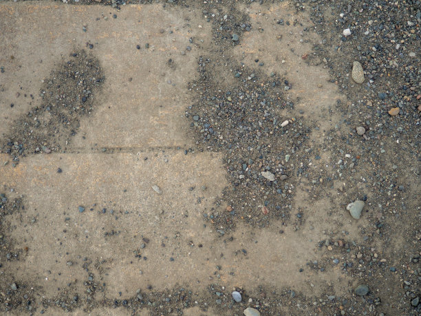 棕色瓷砖和小鹅卵石的背景。实心材质图案。瓷砖上的鹅卵石。图片下载