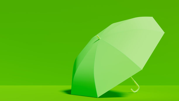 绿色伞倚在绿色风景的地板上，用于创意主题，水平位置图片下载