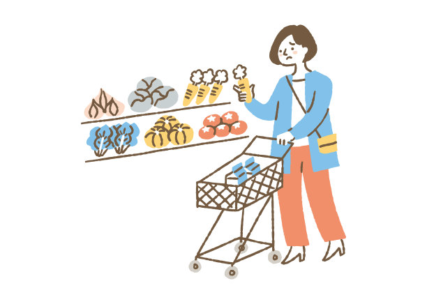 一位妇女正在考虑是否要买颜色的蔬菜图片下载