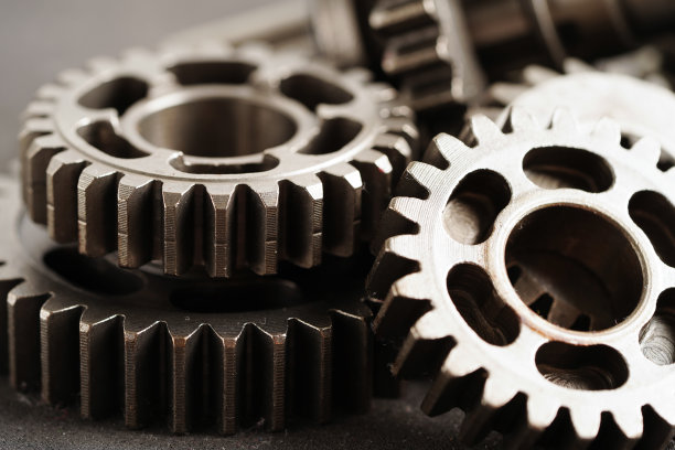 金属齿轮发动机汽车和自行车，机械工业概念。图片下载