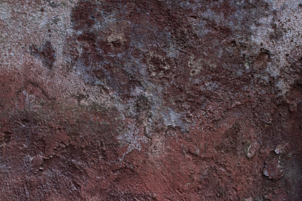 旧的，复古的墙与对比鲜明的斑点。图片下载