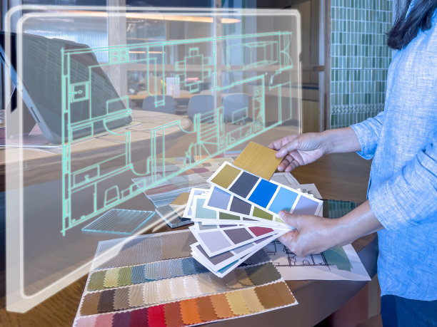 现代设计师使用智能设备。未来科技概念。图片下载