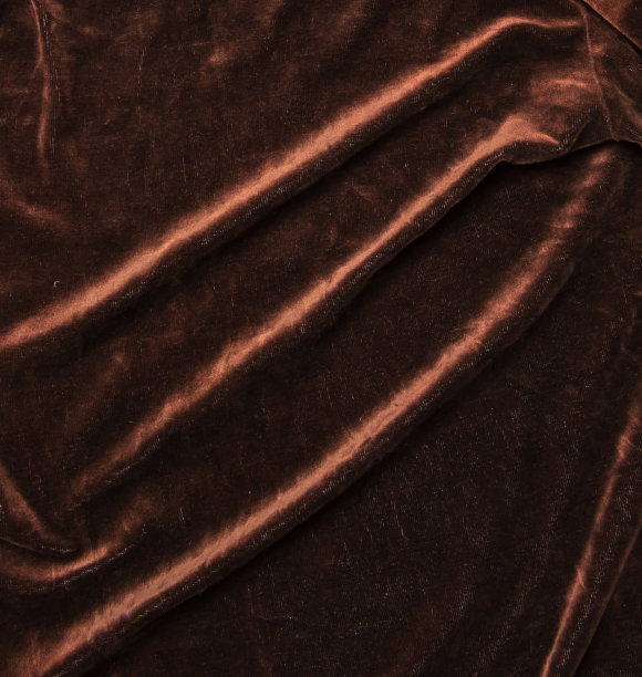背景为棕色天鹅绒织物。现代软垫天鹅绒家具。创意复古背景。图片下载