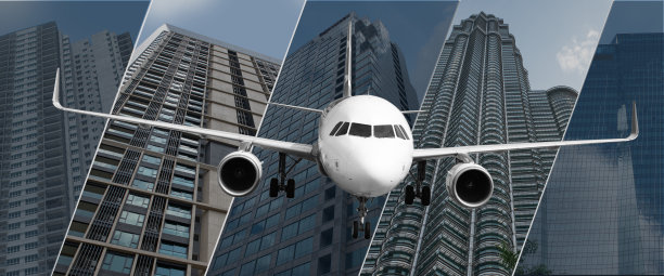 飞机着陆前视图与摩天大楼的背景-旅行主题图片下载