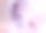 年轻女子的霓虹灯肖像。影棚拍摄。模特在紫色、红色和粉色灯光下摆姿势。图片下载