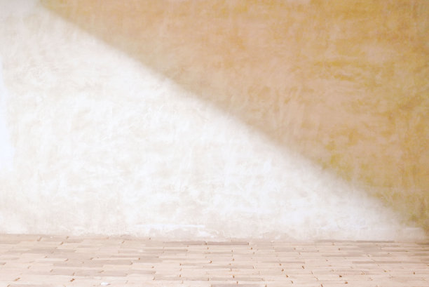 米色水泥墙，空室光影。图片下载