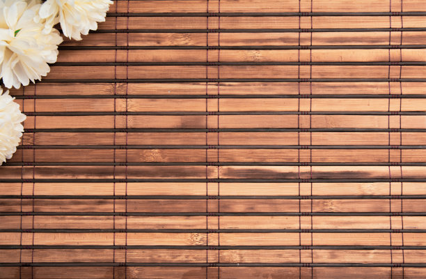 背景创建与细木竹棒和背景与花的边缘图片下载