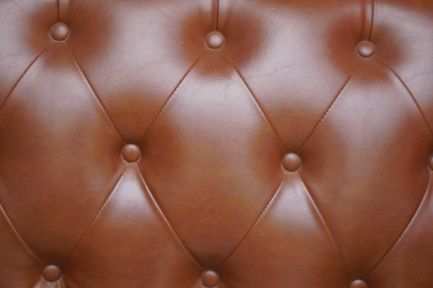 背景图案棕色沙发靠垫图片下载