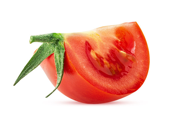 新鲜的红番茄片配绿叶图片下载