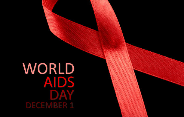 艾滋病意识标志红丝带。世界艾滋病日概念，12月1日。红丝带作为白色上艾滋病意识的象征。图片下载