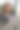 一名非洲妇女在外面用笔记本电脑工作。图片下载