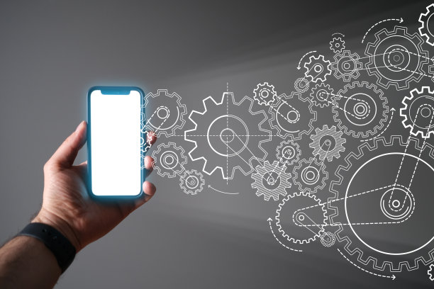 智能手机与车床齿轮图片下载