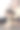 戴头巾的年轻女性涂抹腿霜、乳液或保湿霜的女性。皮肤护理。美女脚上涂着奶油图片下载