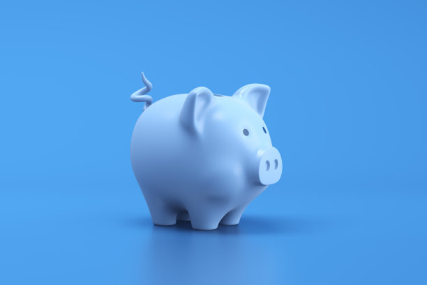 蓝色背景上的小猪储蓄概念图片下载