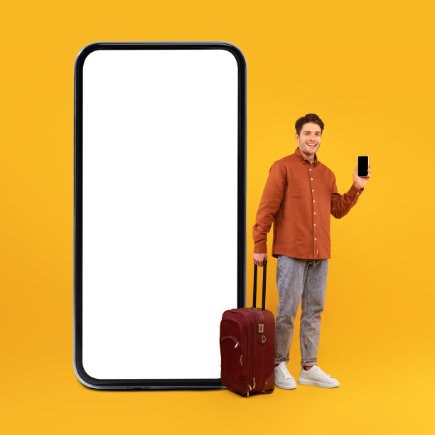 靠近大手机的游客在工作室里展示他的手机图片下载