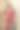 系列工作室的照片，年轻的女模特在红色花绸缎中长裙。图片下载