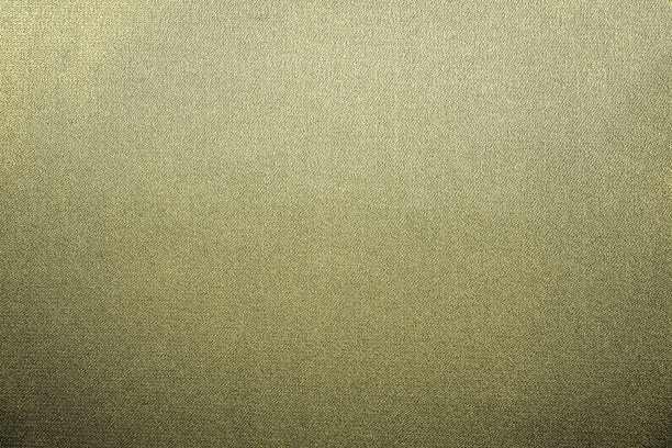 灰蒙蒙的淡棕色，黄色，绿色鼠尾草，米黄色，金色，橄榄色，抽象的复古背景。闪亮的织物。梯度。图片下载