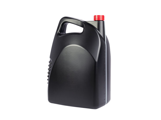 白色背景上孤立的黑色罐发动机油。图片下载