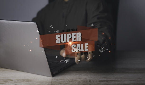 年轻人用笔记本电脑在网上购物，有超级折扣促销图片下载