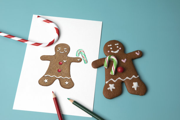 彩色铅笔画和蓝色背景的姜饼图片下载